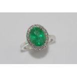 Good 18ct white gold, emerald and diamond ring