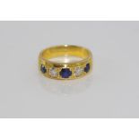 18ct yellow gold, sapphire and diamond ring