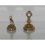 Two antique gilt and hard stone seals