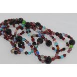 Long multi-coloured glass bead necklace