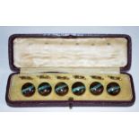 Cased set of six antique buttons