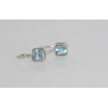 9ct white gold earrings set with blue topaz