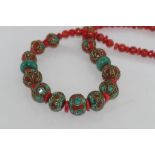 Necklace with old Nepalese beads, coral and silver