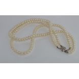 Double strand pearl necklace