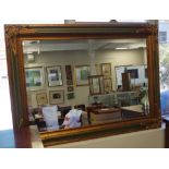 Large gilt framed wall mirror