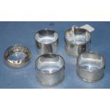 Five various early sterling silver napkin rings