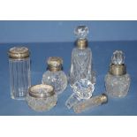 Four sterling silver &cut crystal toiletry bottles