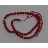 Strand of graduated Italian red coral beads