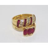 Two 18ct yellow gold ruby and diamond rings