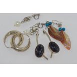 Four various pairs earrings