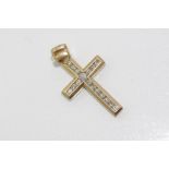 Yellow gold, channel set diamond cross