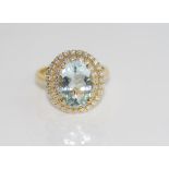 18ct yellow gold, aquamarine and diamond ring