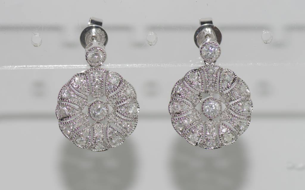 18ct white gold, flower shaped diamond earrings