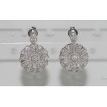 18ct white gold, flower shaped diamond earrings