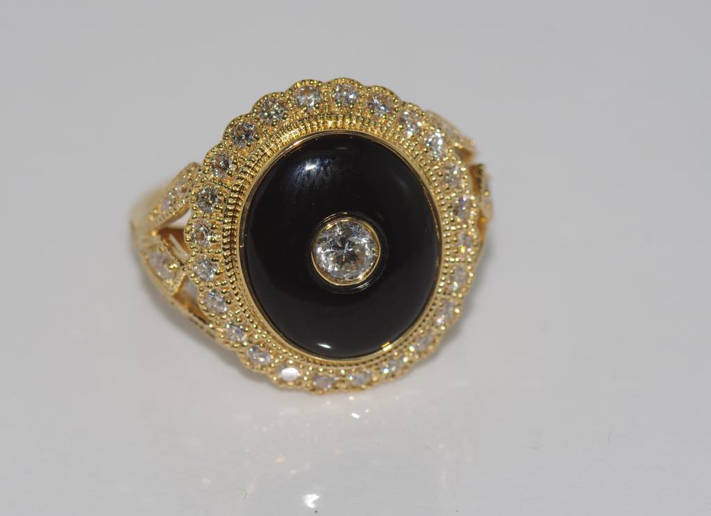 18ct gold, onyx & diamond ring