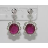 18ct white gold, ruby and diamond earrings