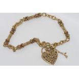 Good 9ct yellow gold bracelet with heart lock