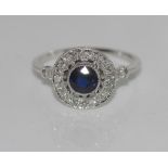 18ct white gold, sapphire and diamond ring