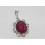 18ct white gold, ruby and diamond pendant