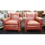 Pair of leather wingback armchairs