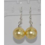 Golden shell pearl earrings