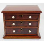 Mahogany tea caddy in form of a chest of drawers