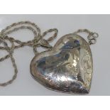 Very large silver heart locket