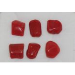 Six various pieces of red Italian coral