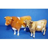 Two various Beswick standing cattle figures