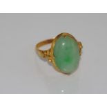 Yellow gold and jade ring marked 22K