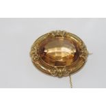 Antique brooch set with facetted glass