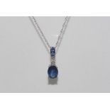 10ct white gold, sapphire and diamond pendant