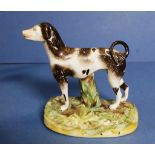 Antique Staffordshire figure of a dog,