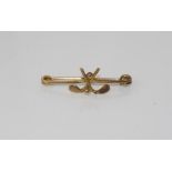 Vintage 9ct gold golfing brooch