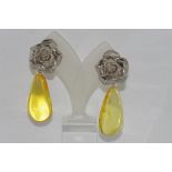 Amber earrings with silver flowers