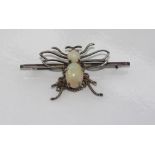 Silver and opal insect brooch