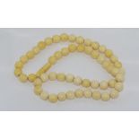 Vintage graduated ivory bead necklace