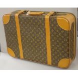 Louis Vuitton monogrammed travelling suitcase
