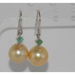 Pearl and emerald earrings