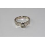 Platinum and princess cut diamond solitaire ring