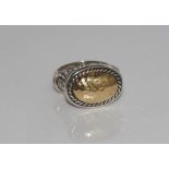 Silver ring with beaten gold detail