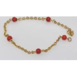 18ct yellow gold and red coral bracelet