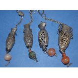 Four various vintage Chinese suspended ornaments