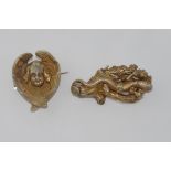 Vintage silver gilt angel and lizard brooches