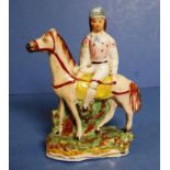 Antique Staffordshire figure of man on horseback