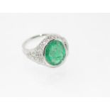 Platinum emerald and diamond ring