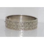 Vintage silver hinged bangle with leaf design