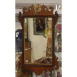 George III fretted walnut and mahogany mirror