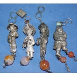 Four various vintage Chinese suspended figures
