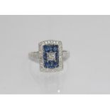 18ct white gold, sapphire and diamond ring